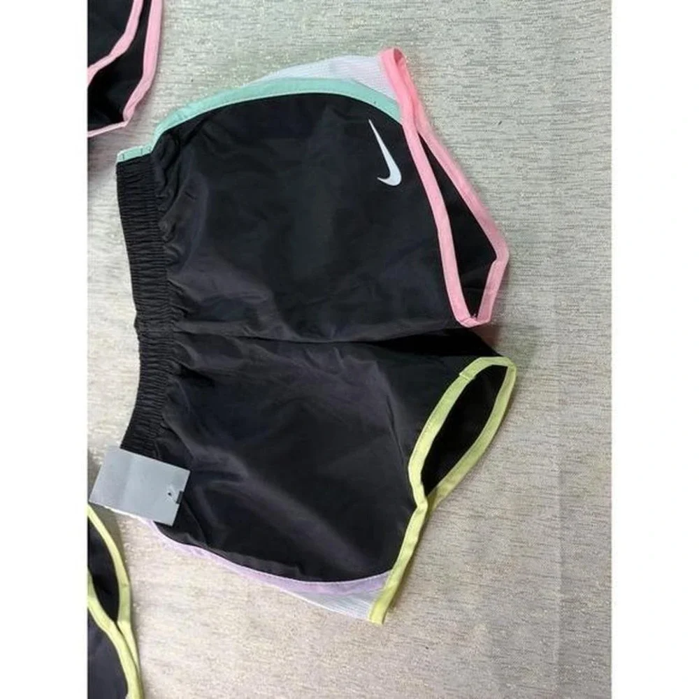 Three pairs of kids Nike dri fit short size 6